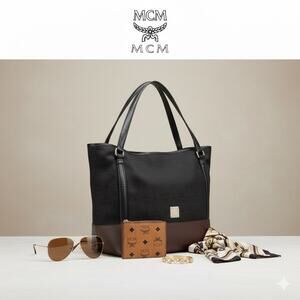 Authenticated MCM Black Hobo Visetos Canvas & Calfskin Leather Purse